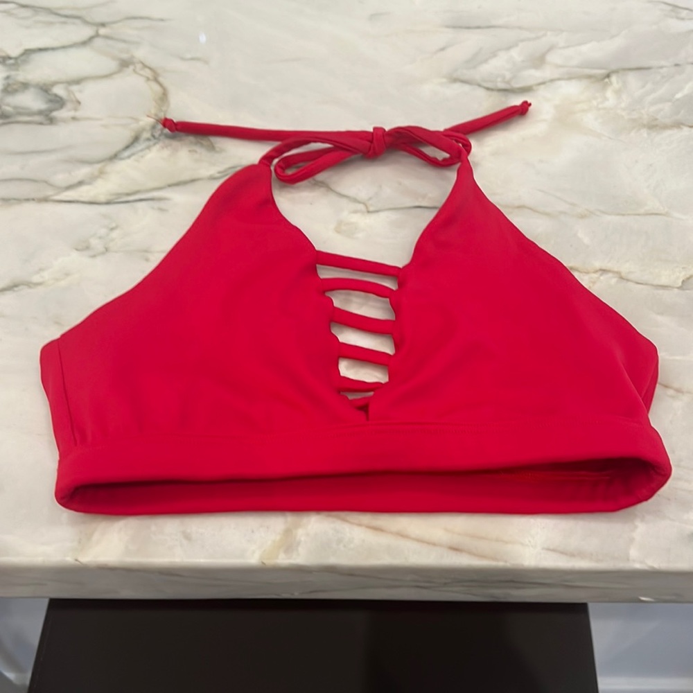 Youth medium second skin. Dance bra, top with tie around the neck. Red